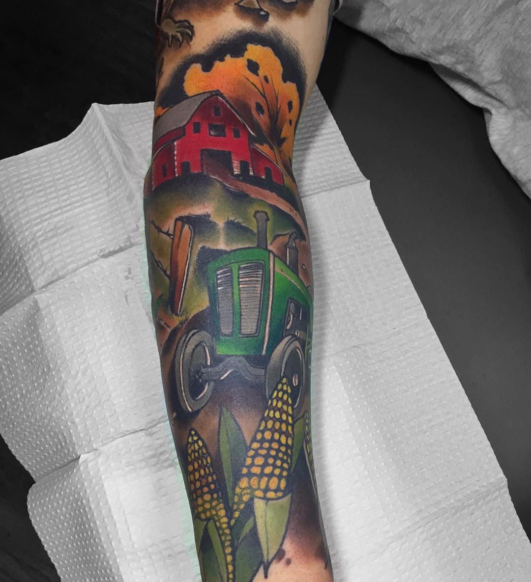 Farm scene American traditional tattoo on the forearm by Derek Hutchison, Des Moines, Iowa
