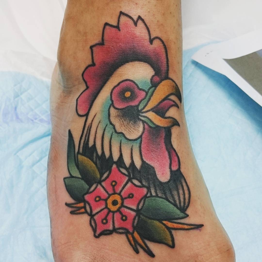 Rooster American traditional tattoo on the foot by Daichi Horiyama