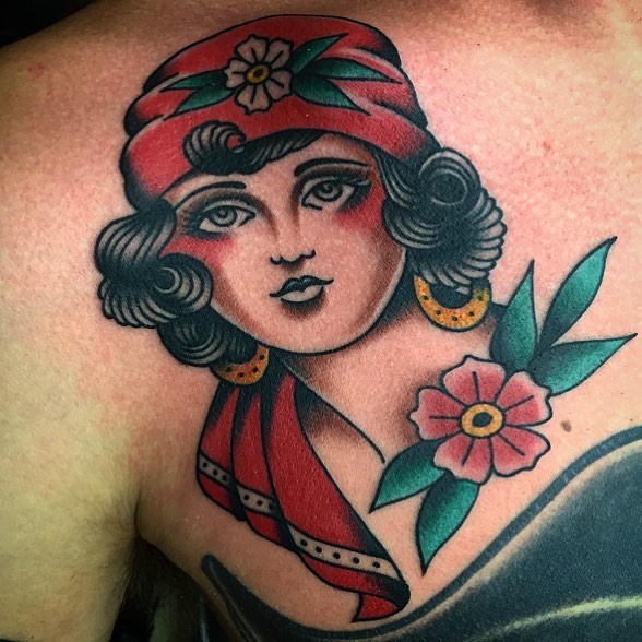 Flapper girl American traditional tattoo on the shoulder by Dave G