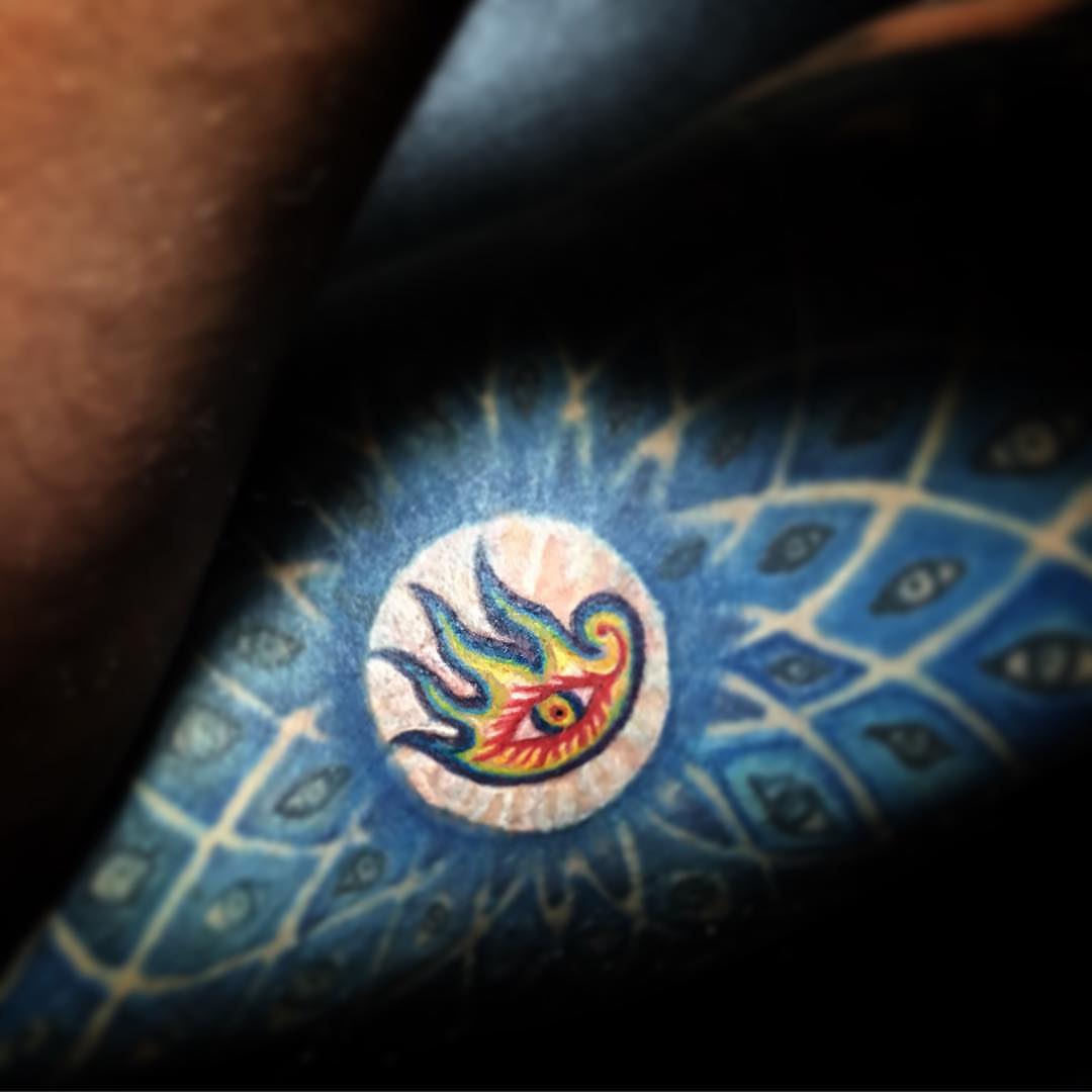 Bird American traditional tattoo on the forearm by Visionary Tattoos
