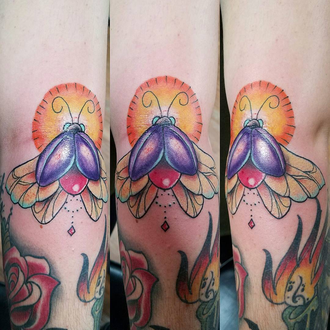 Butterfly American traditional tattoo on the forearm by Dick Eckman