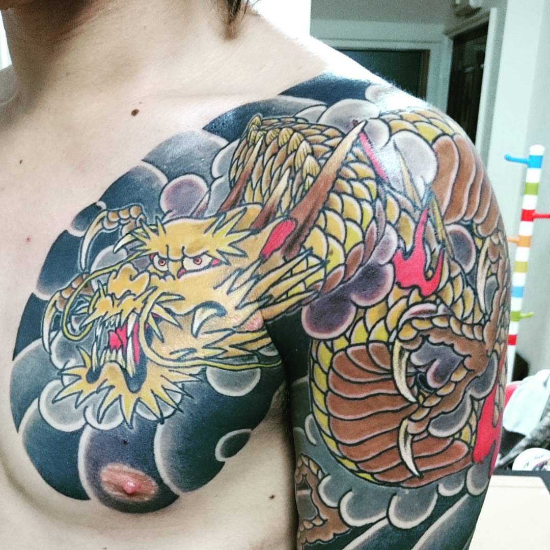 Dragon japanese irezumi tattoo on the back by Daichi Horiyama