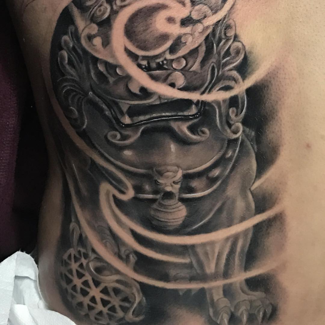 Mask black and grey tattoo on the shoulder by Rocky Nguyen DFW Dallas Japanese
