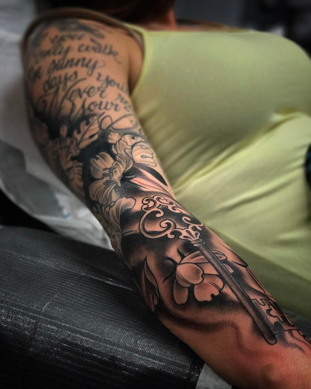 Floral key American traditional tattoo on the forearm by Derek Hutchison, Des Moines, Iowa