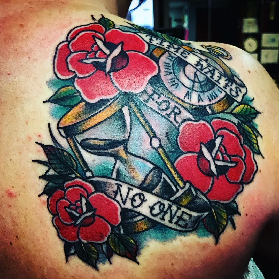 Hourglass and roses American traditional tattoo on the shoulder by GABRIELExTATTOOS