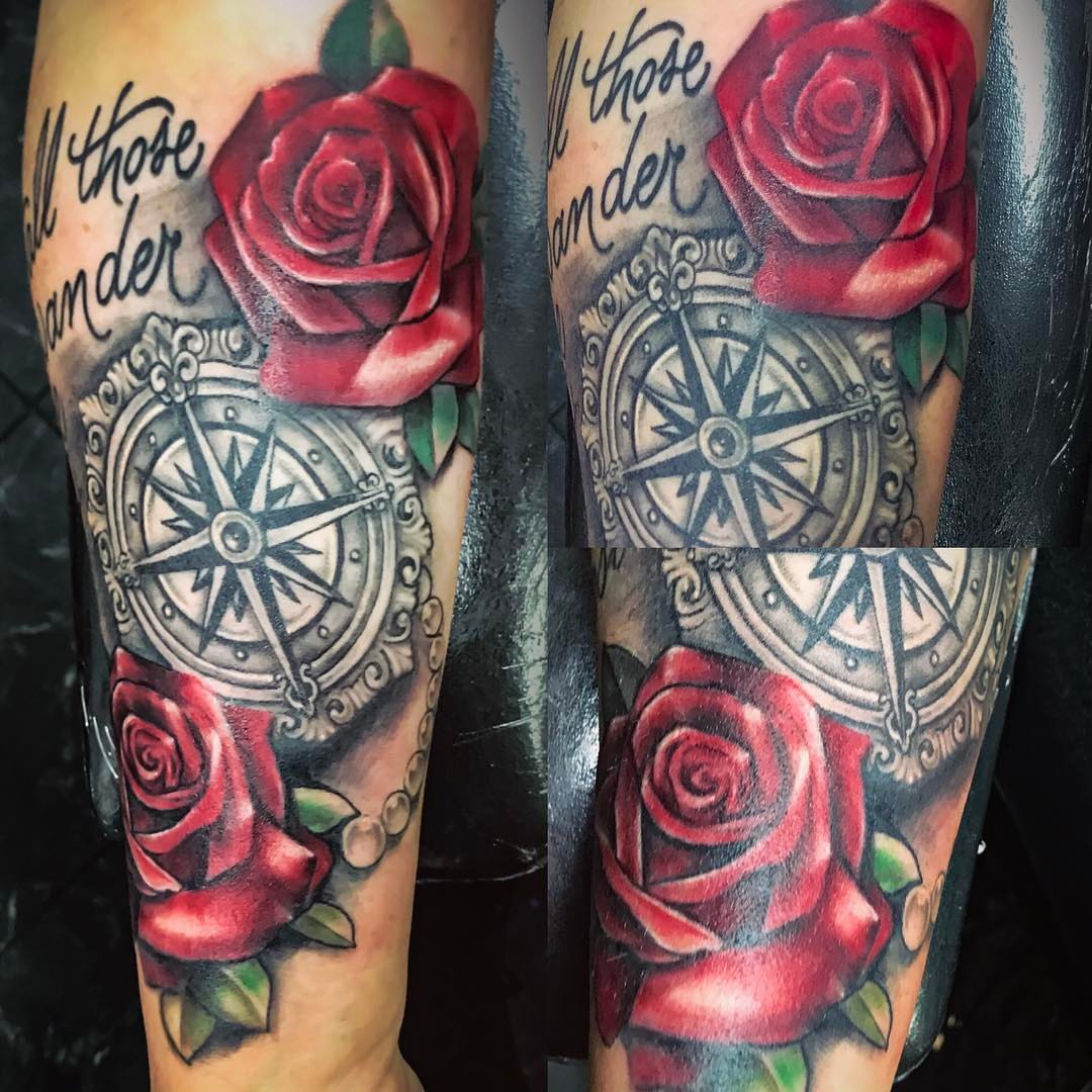 Red roses and compass American traditional tattoo on the forearm by GABRIELExTATTOOS