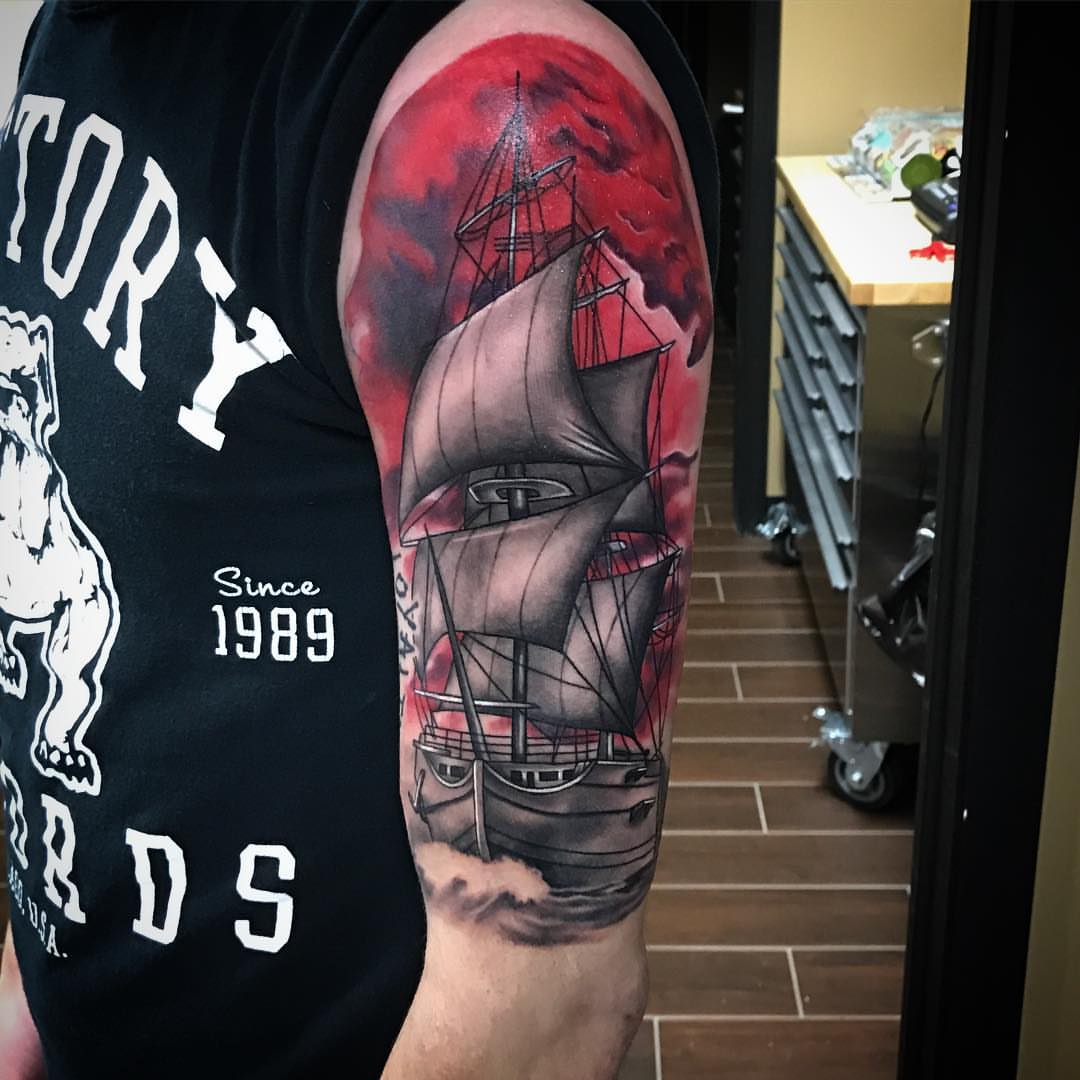 Ship realism tattoo on the forearm by Joe Shepp