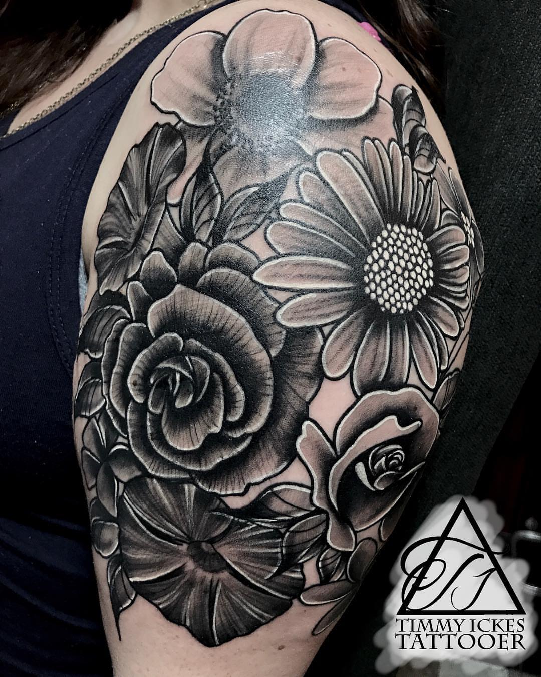 Floral arrangement realism tattoo on the shoulder by Timmy Ickes