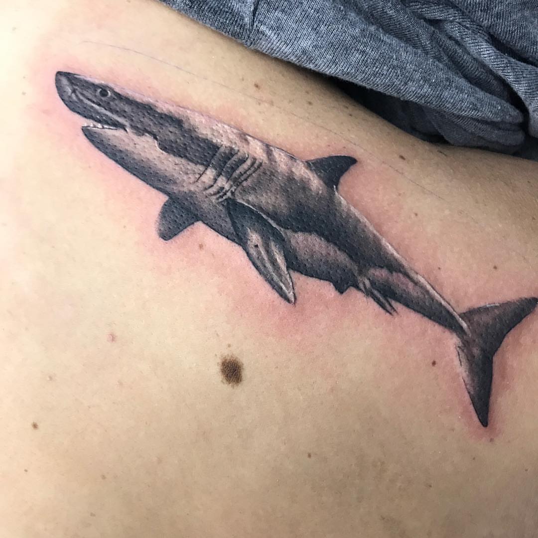 Great white shark realism tattoo on the thigh by Trevor Sibary