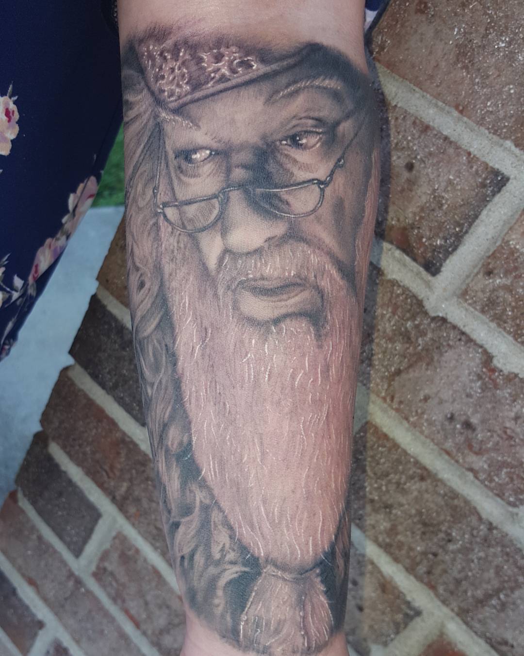 Wizard realism tattoo on the forearm by Jon Goad