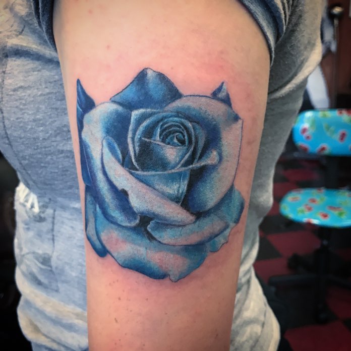 Blue rose realism tattoo on the forearm by Caitlin Curtis Tattoos & Booking, Dayton, Ohio