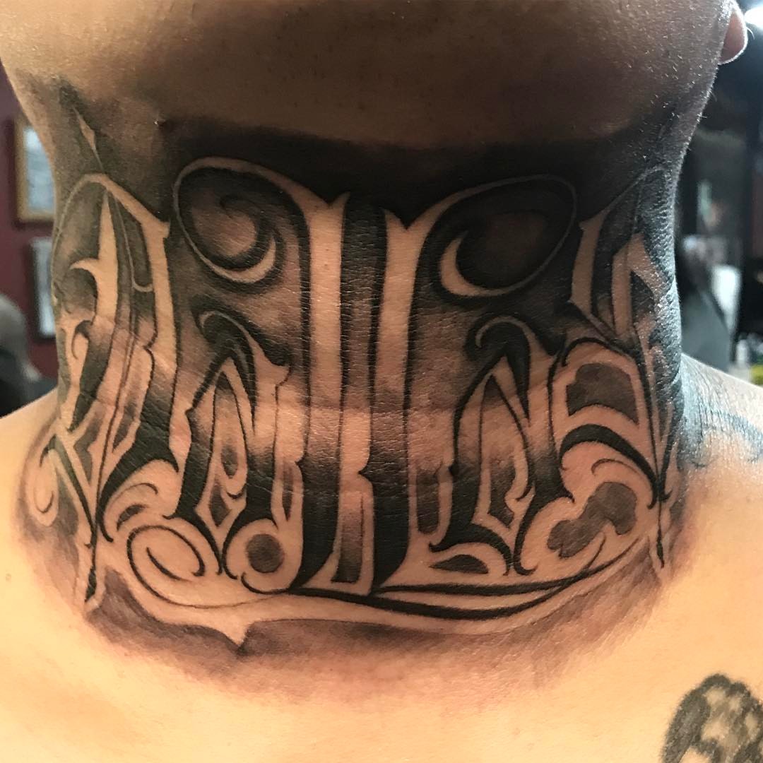 Tribal lettering tribal tattoo on the neck by Rocky Nguyen DFW Dallas Japanese
