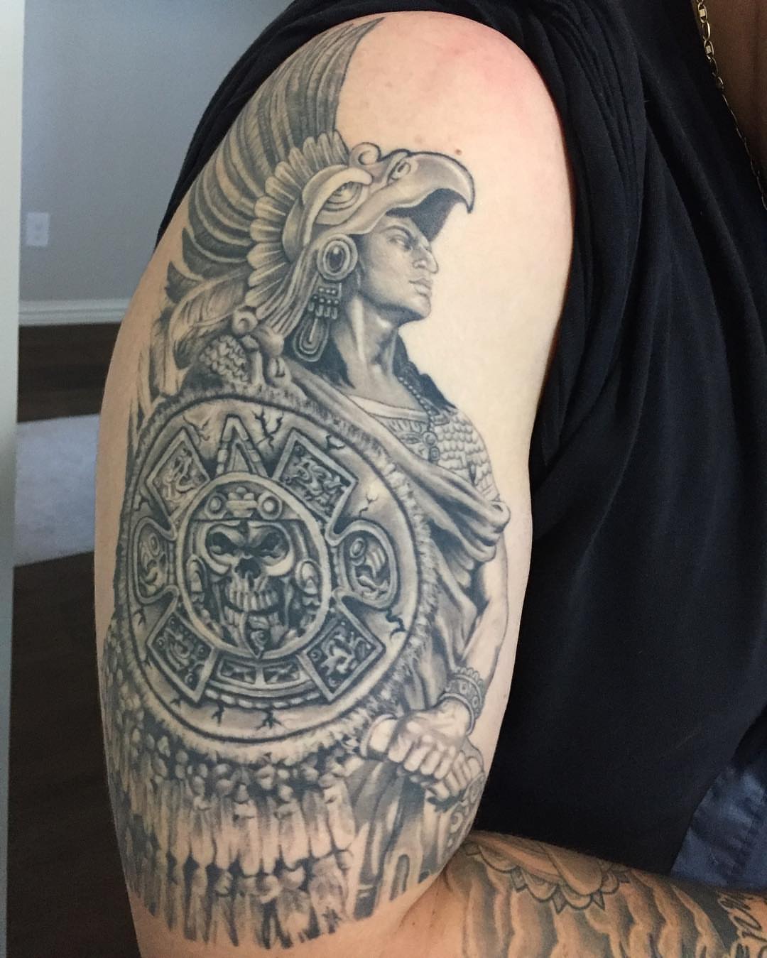 Mexican warrior realism tattoo on the shoulder by Artfabn