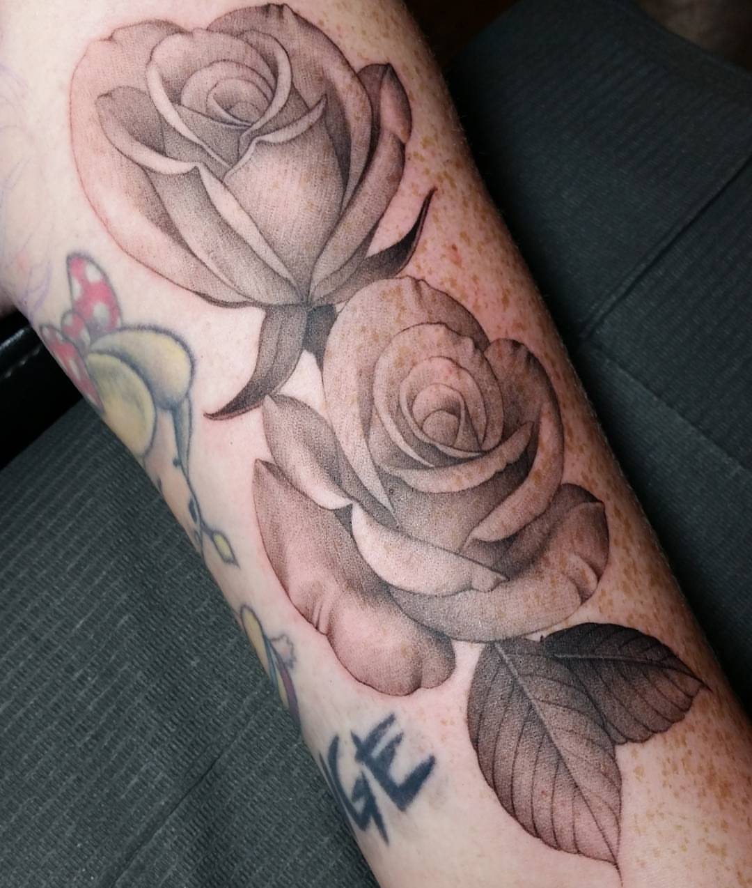 Roses black and grey tattoo on the forearm by @jaclyngreb