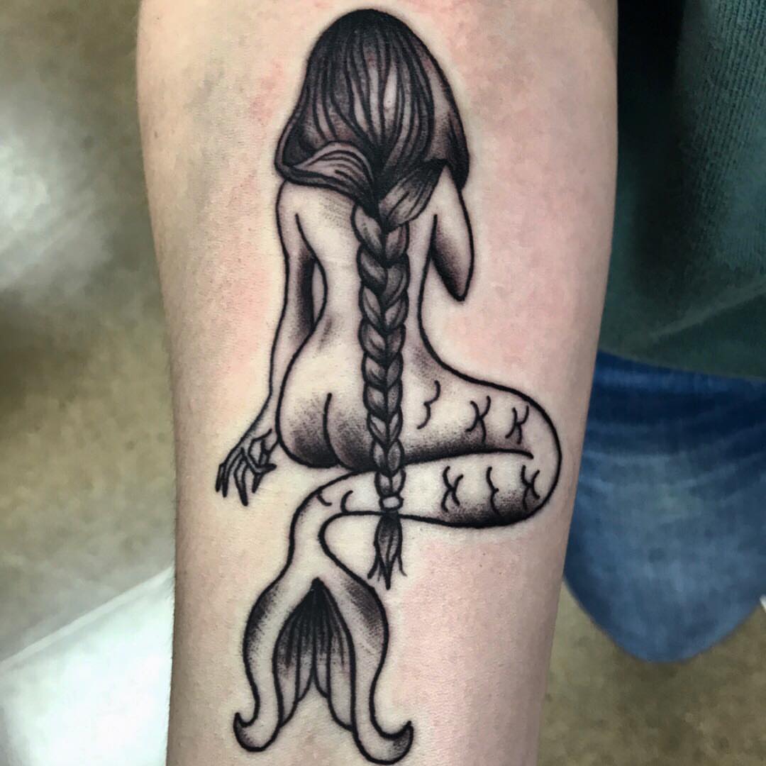 Mermaid black and grey tattoo on the forearm by Danielle Dubois