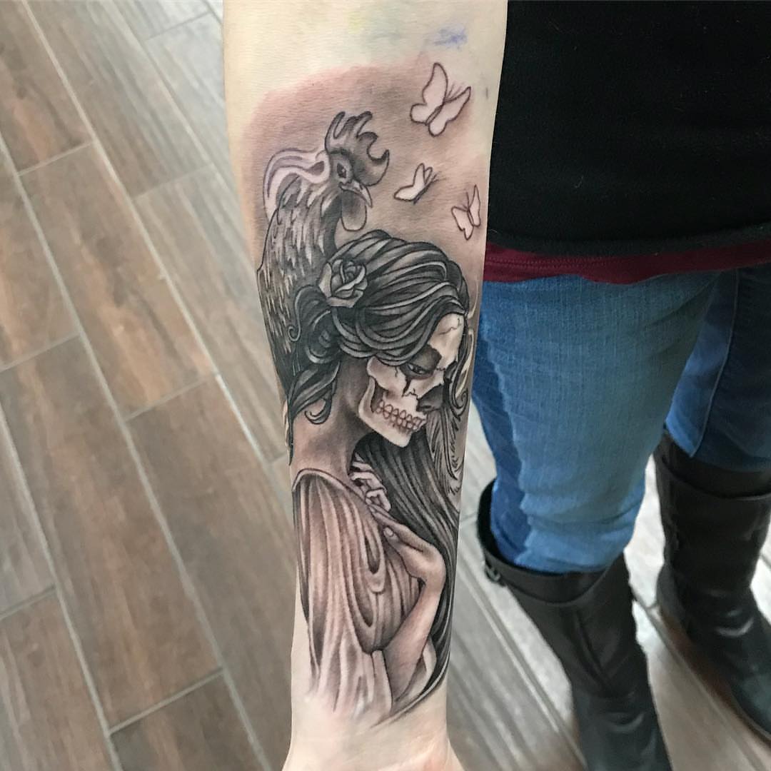Skeleton couple realism tattoo on the forearm by Joe Shepp
