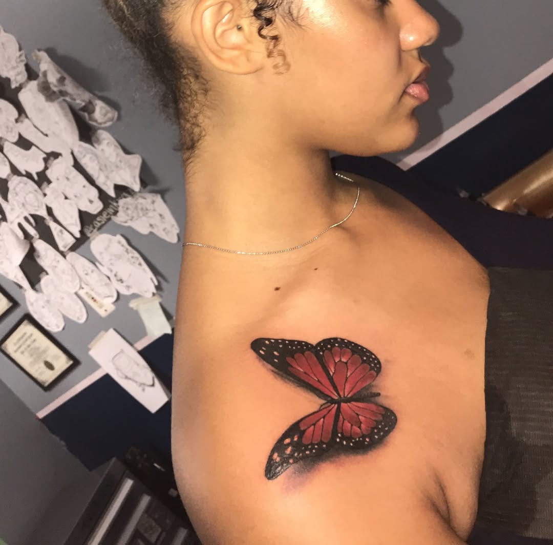 Monarch butterfly fine line tattoo on the chest by 2realink - Tattoo Artist
