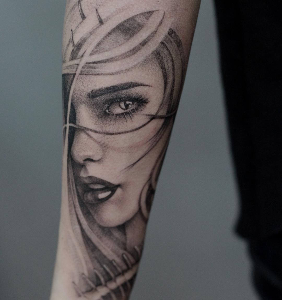 Woman's face realism tattoo on the forearm by Anna Chernova, San Francisco, California