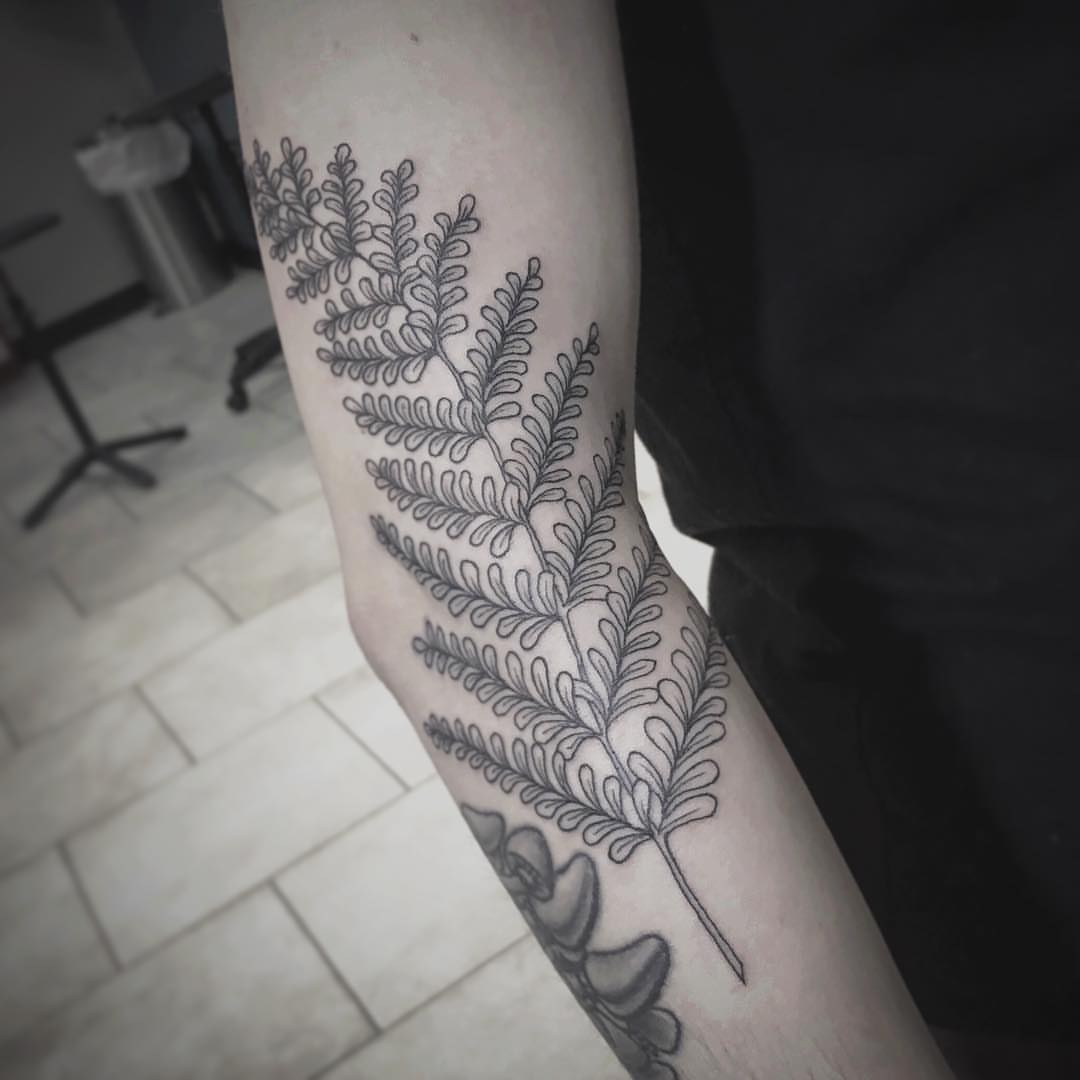 Fern black and grey tattoo on the forearm by Michigan Tattoo Artist