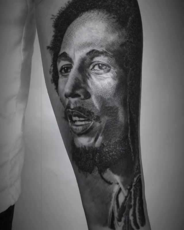 Bob Marley portrait realism tattoo by Carlos Macedo Tattoo