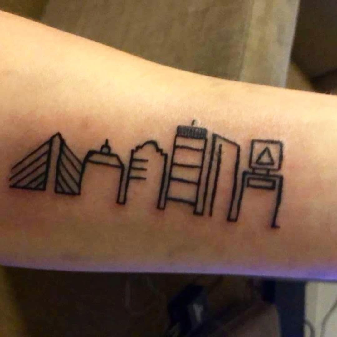 City skyline tattoo on the forearm by @beantowntats