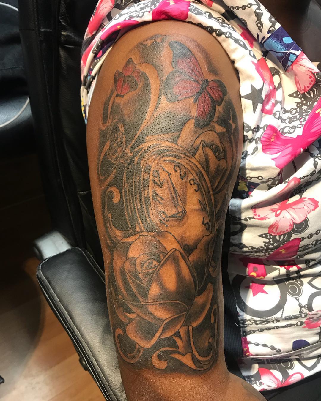 Clock and rose dotwork tattoo on the forearm by pecous