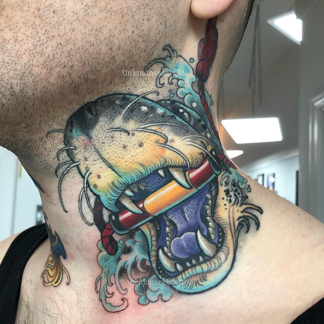 Cat American traditional tattoo on the neck by Erin Chance