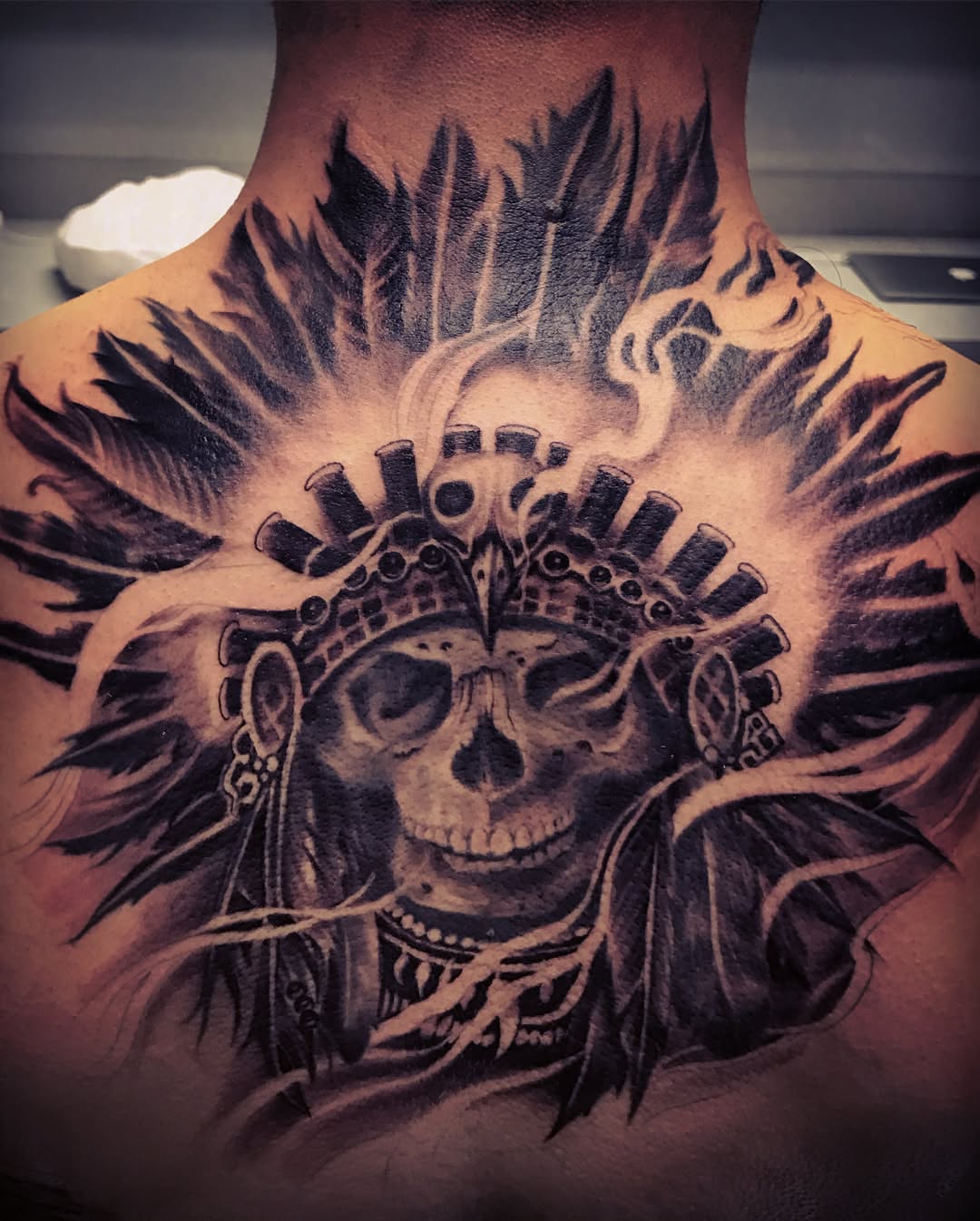 Skull with feathers realism tattoo on the back by Rocky Nguyen DFW Dallas Japanese