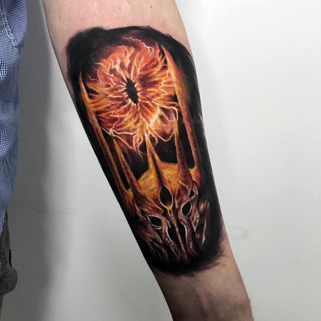 Eye with lightning realism tattoo on the forearm by Aren