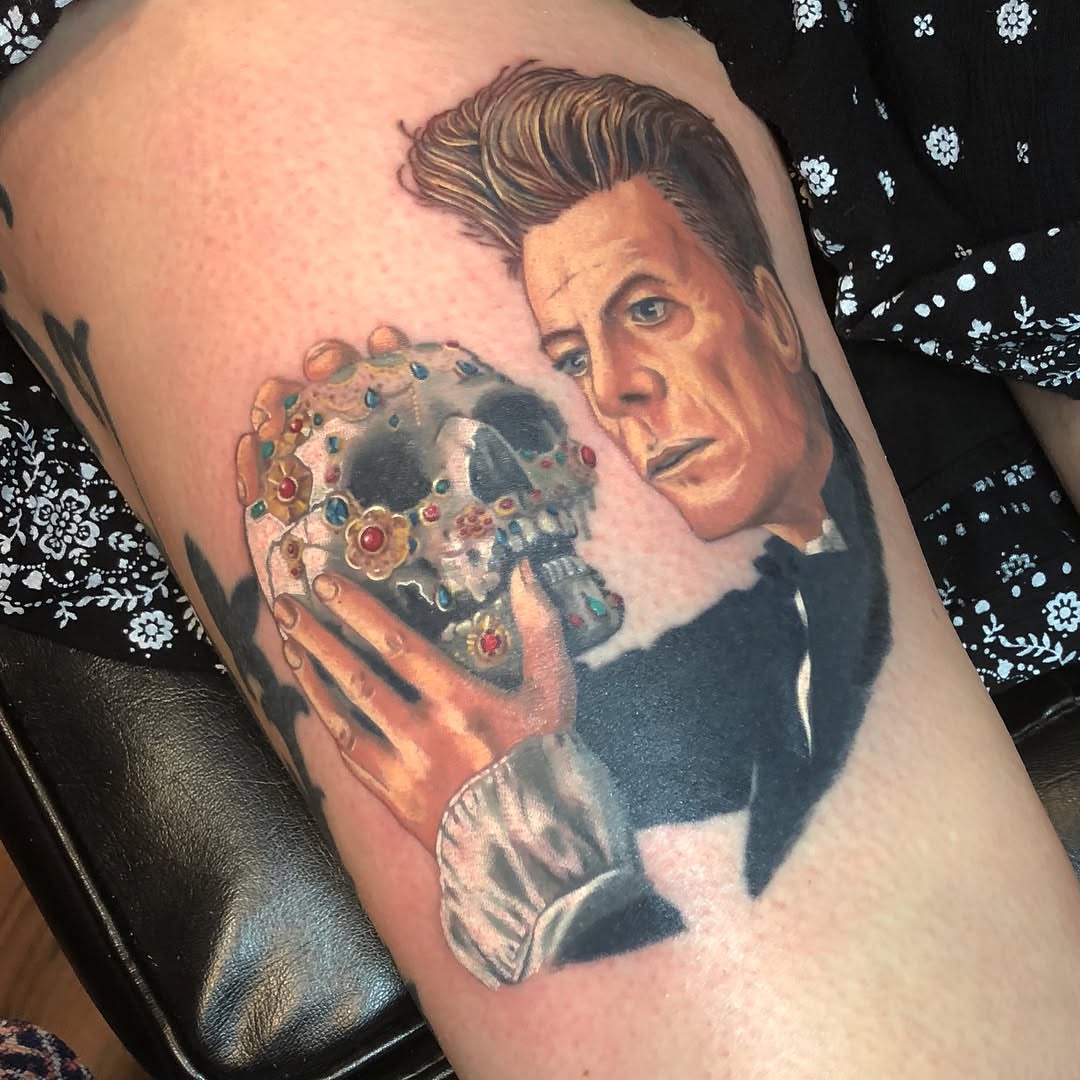David Bowie realism tattoo on the thigh by alexandra