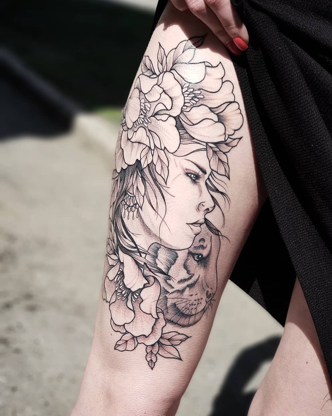 Woman with flowers realism tattoo on the thigh by Nikita Grinenko, San Francisco