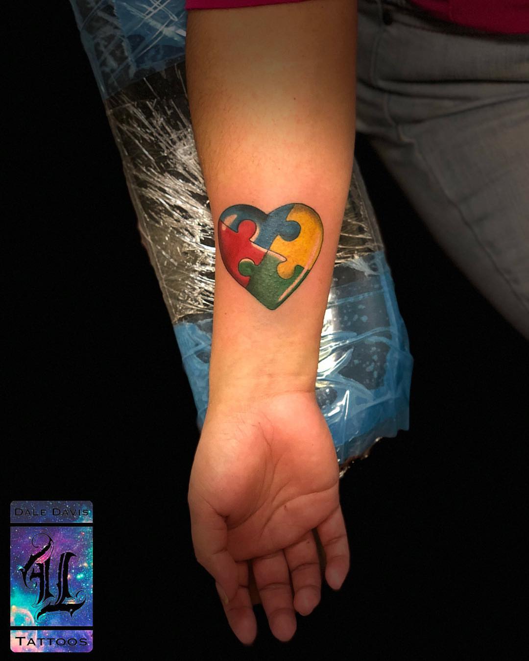 Autism awareness puzzle heart geometric tattoo on the forearm by DJ ๐จ๐พโ๐จ