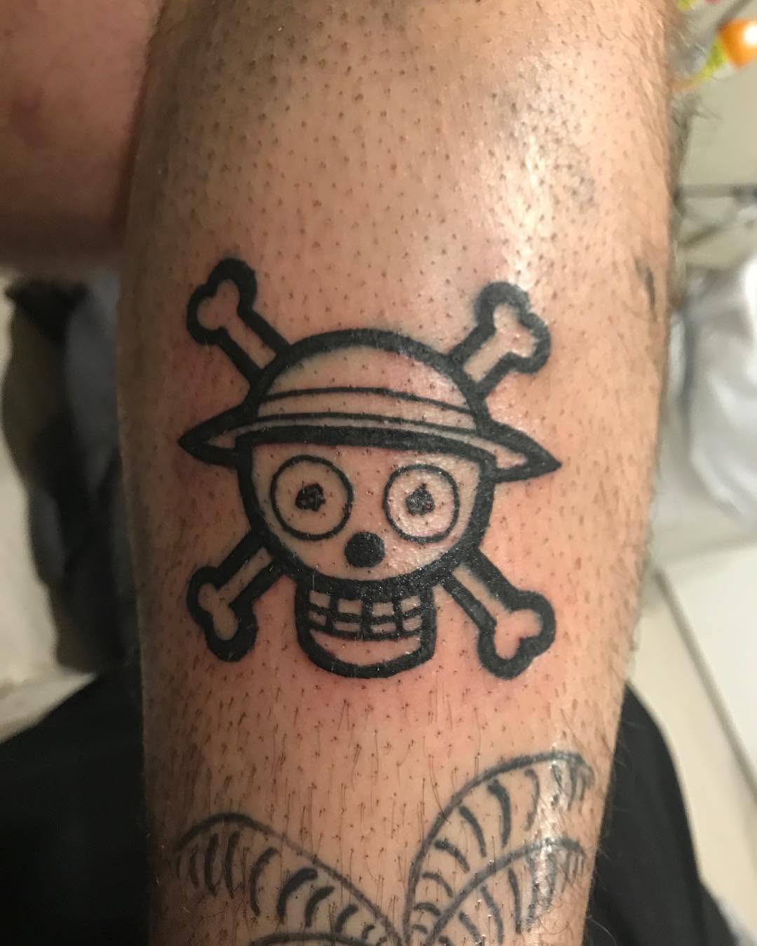 One Piece Jolly Roger new school tattoo on the forearm by @beantowntats