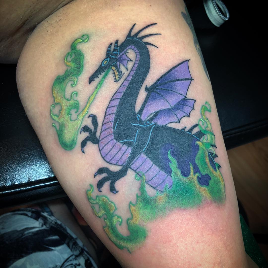 Dragon new school tattoo on the thigh by alexandra