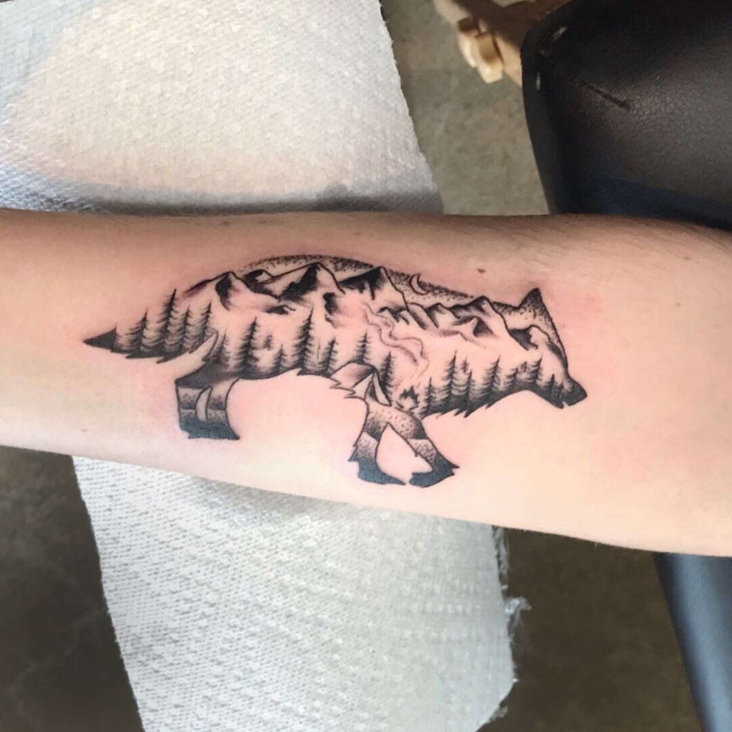 Mountain landscape dotwork tattoo on the forearm by Danielle Dubois