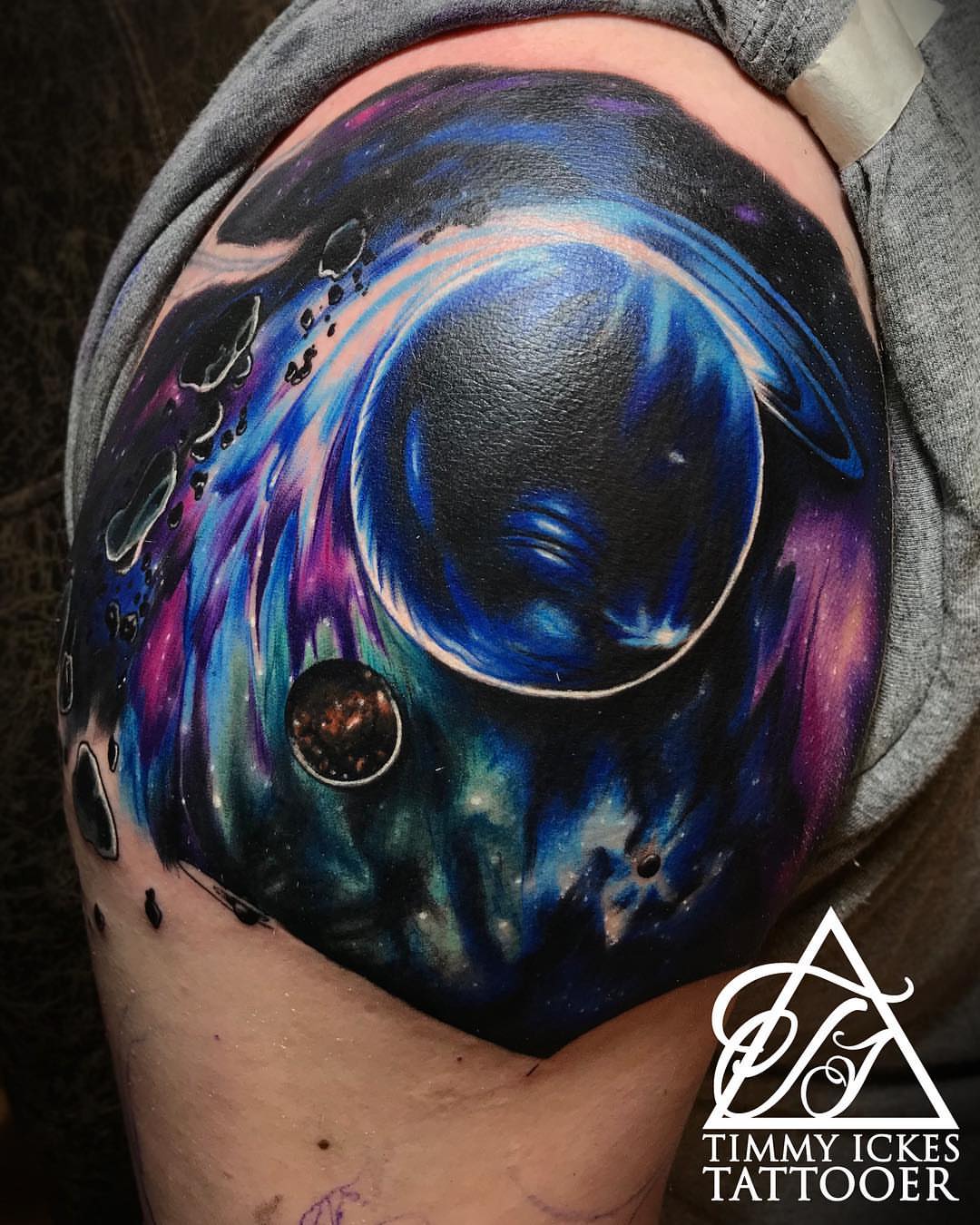 Galaxy dotwork tattoo on the shoulder by Timmy Ickes