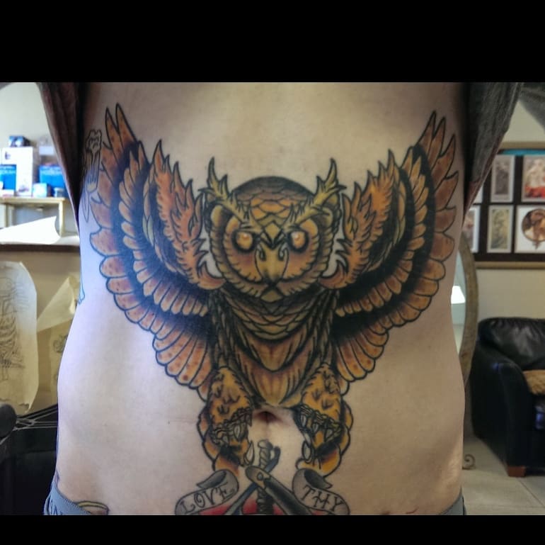 Owl American traditional tattoo on the torso by Rue McLean