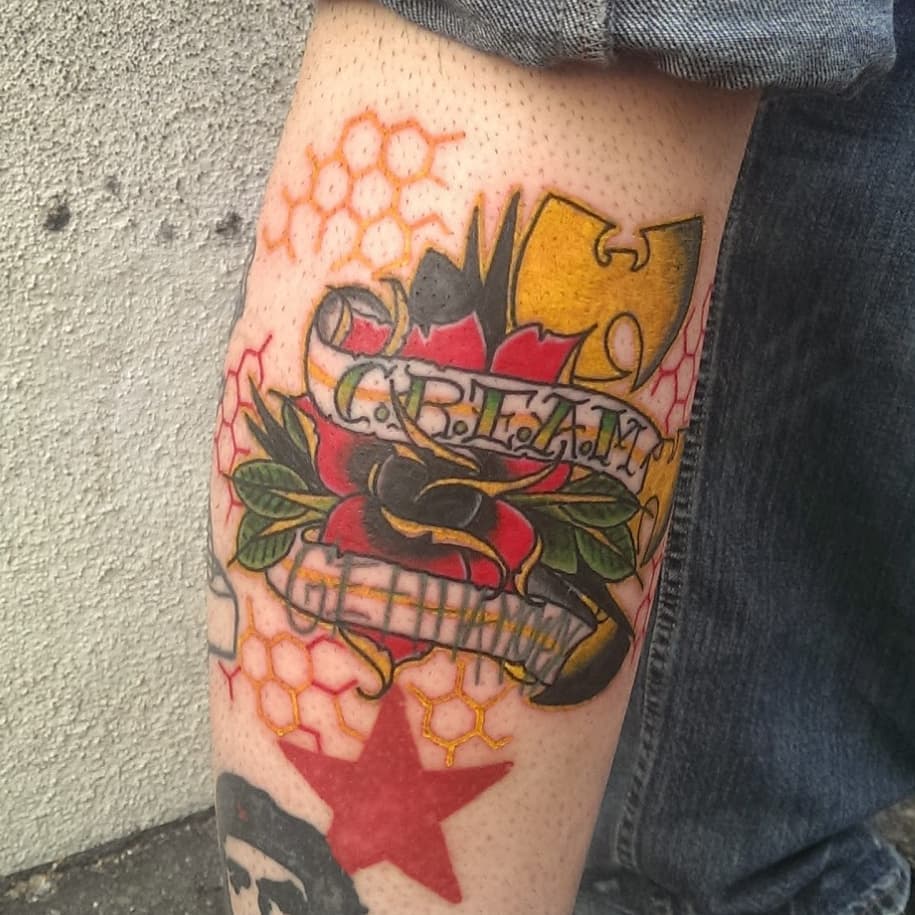 Wu-Tang Clan logo American traditional tattoo on the thigh by Rue McLean
