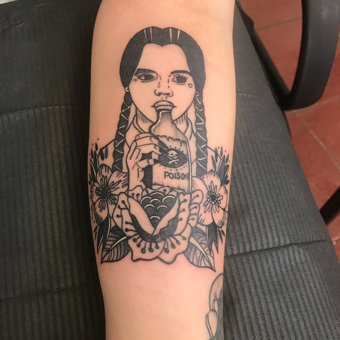 Wednesday Addams American traditional tattoo on the forearm by Felix 🔸 Chesto (Tattooers)