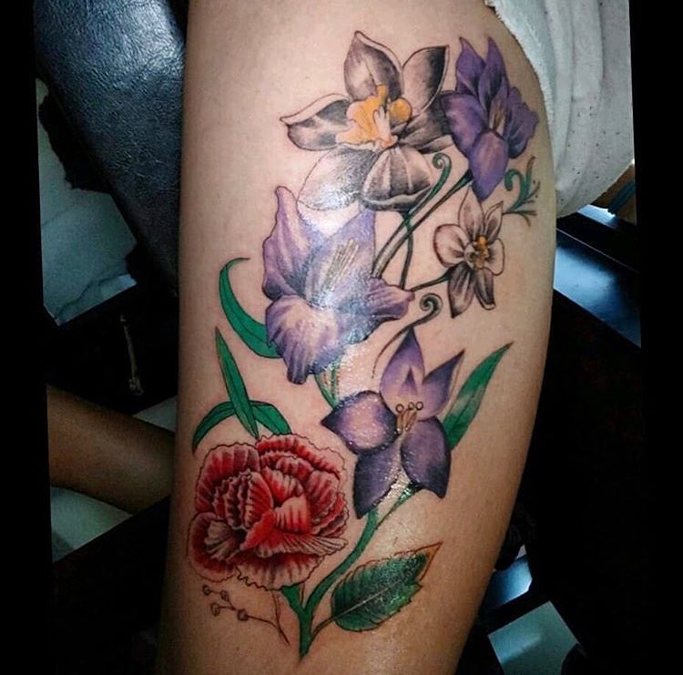 Floral arrangement watercolor tattoo on the thigh by Felix 🔸 Chesto (Tattooers)