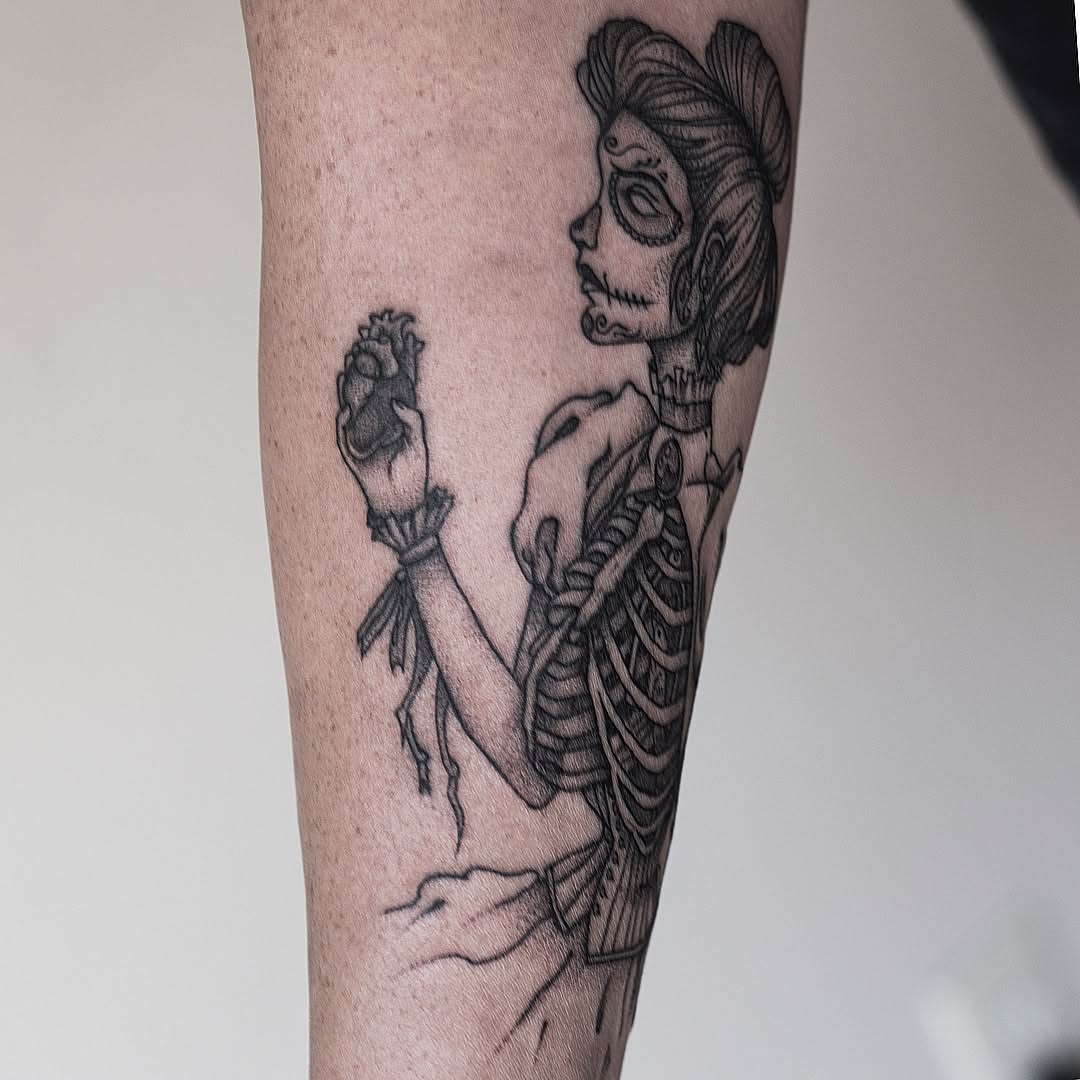 Skeleton woman black and grey tattoo on the forearm by Luis Marrufo