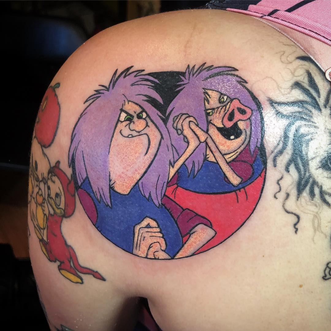 The Flintstones characters dotwork tattoo on the shoulder by alexandra