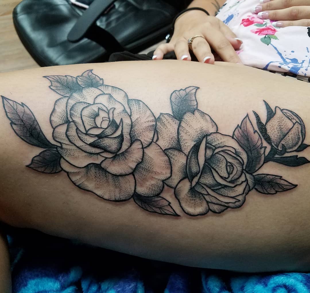 Roses dotwork tattoo on the thigh by Dick Eckman