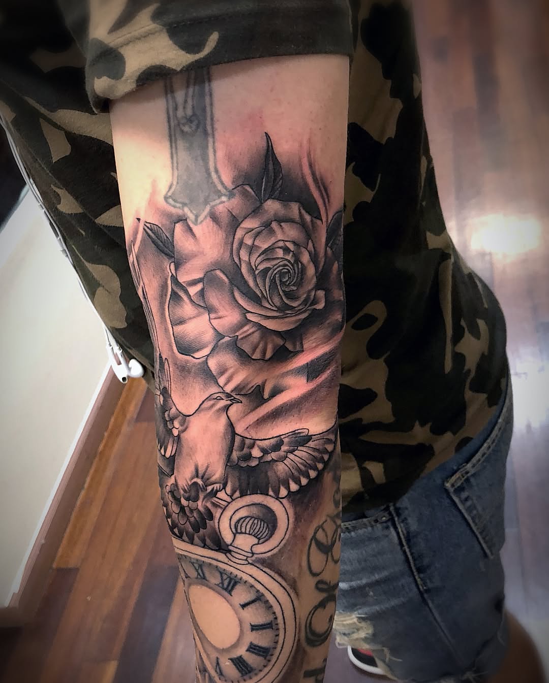 Rose and pocket watch realism tattoo on the forearm by DJ ๐จ๐พโ๐จ