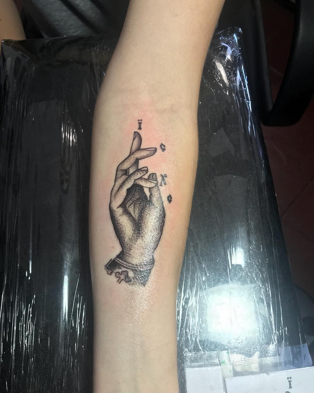 Hand with letters black and grey tattoo on the forearm by Felix 🔸 Chesto (Tattooers)