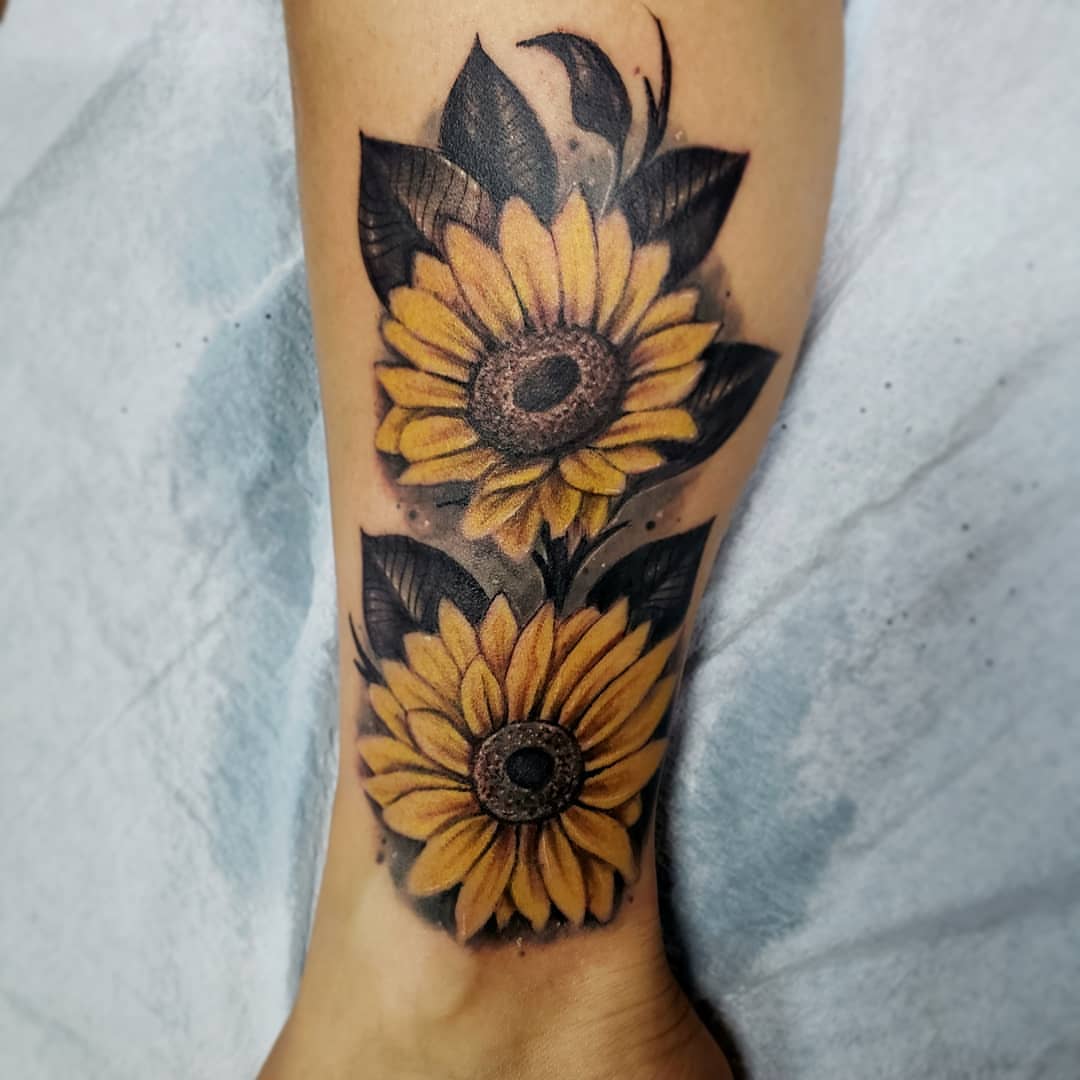 Sunflower realism tattoo on the forearm by Greg West Sac tattoo artist, West Sacramento, California