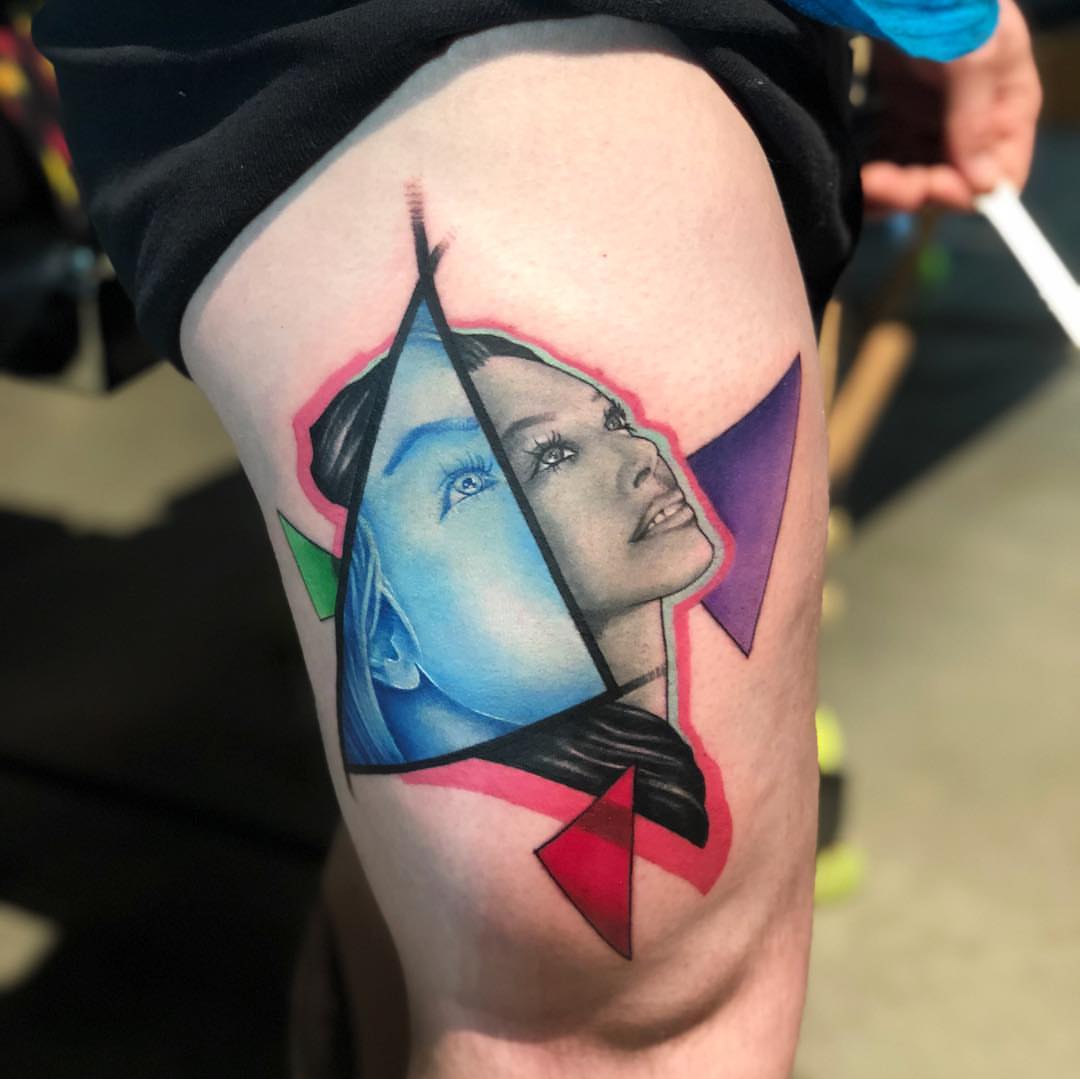 Abstract portrait geometric tattoo on the thigh by Saint Jimmy