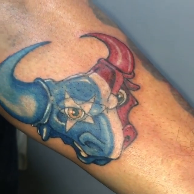 Bull head new school tattoo by Tattoos by Rey G.