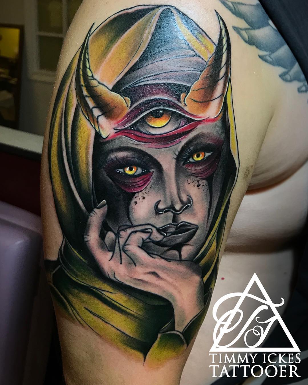 Female demon dark realism tattoo on the forearm by Timmy Ickes