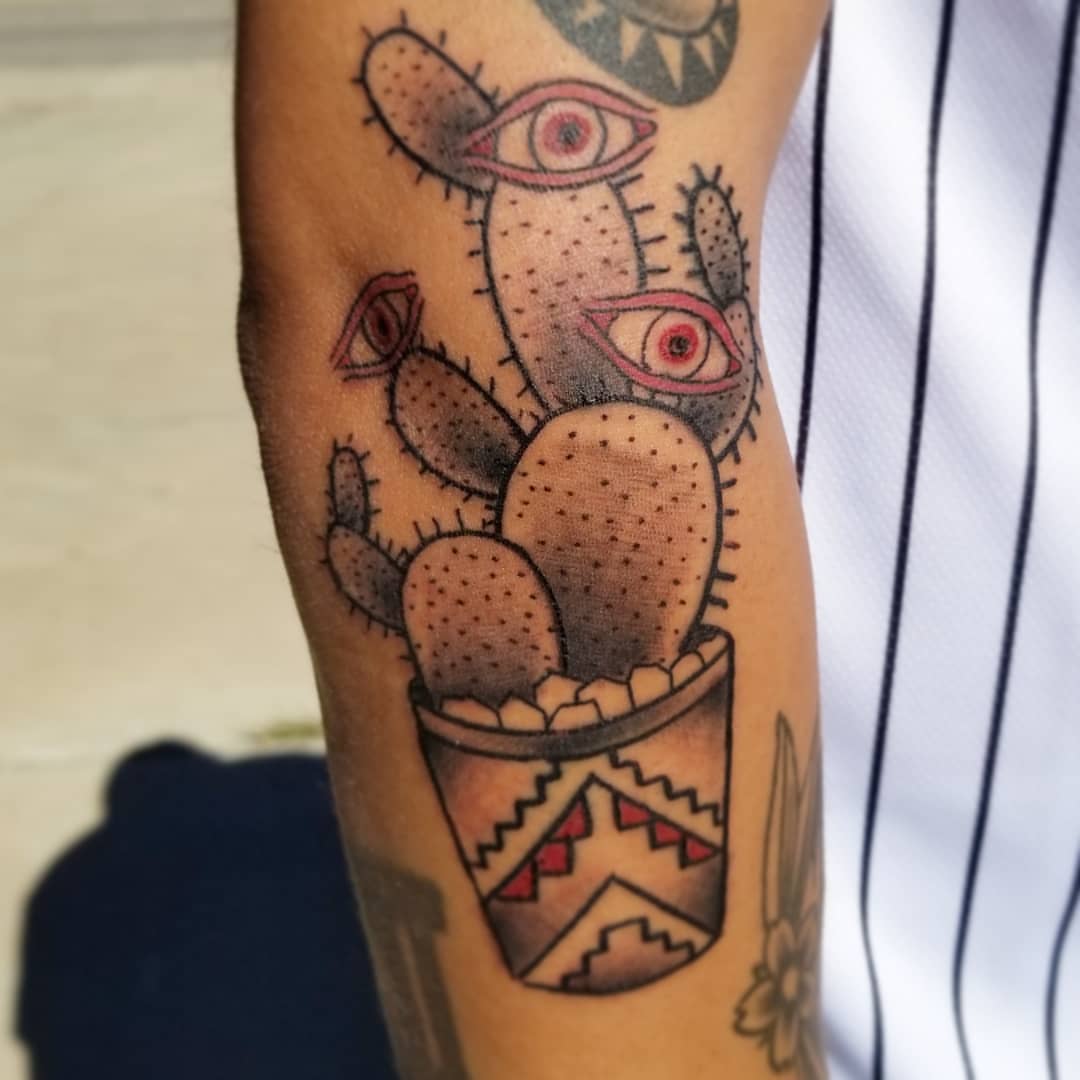 Cactus with eyes American traditional tattoo on the forearm by TattoosbyPhatboi